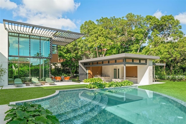 outdoor pool featuring a pergola, a patio, and a yard