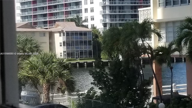 view of building exterior with a water view