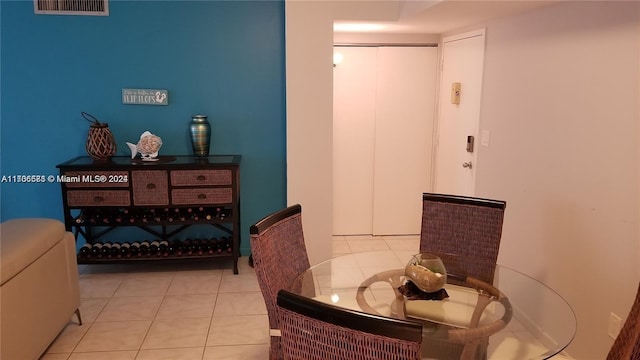 dining room featuring light tile patterned flooring