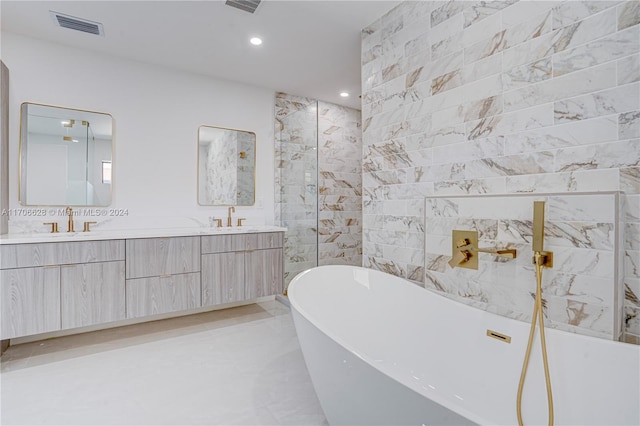 bathroom featuring vanity and a bathtub