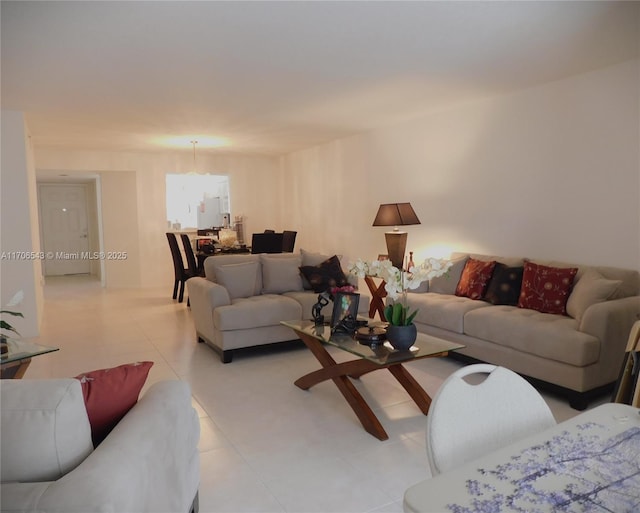 5749 Gemstone Ct Unit 307, Boynton Beach, FL 33437 - living area with light tile patterned floors and a chandelier