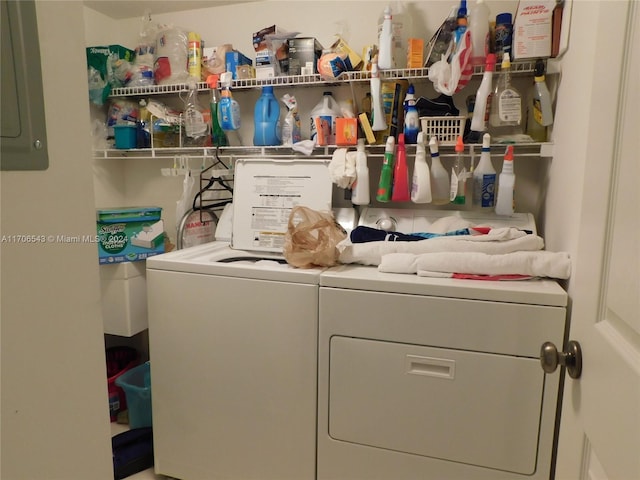 laundry room featuring independent washer and dryer and electric panel