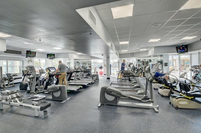 5749 Gemstone Ct Unit 307, Boynton Beach, FL 33437 - gym with a paneled ceiling and plenty of natural light