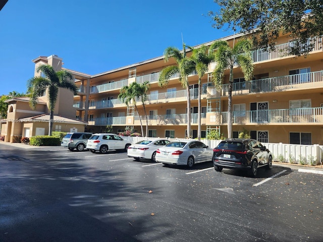 5749 Gemstone Ct Unit 307, Boynton Beach, FL 33437 - view of apartment building / complex with uncovered parking