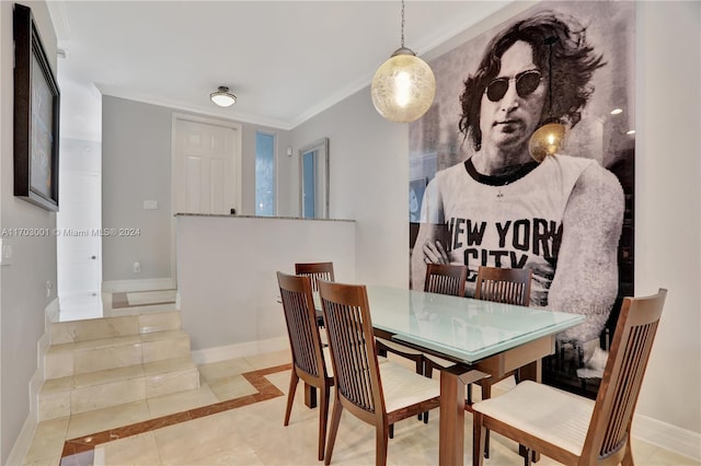 tiled dining space with crown molding