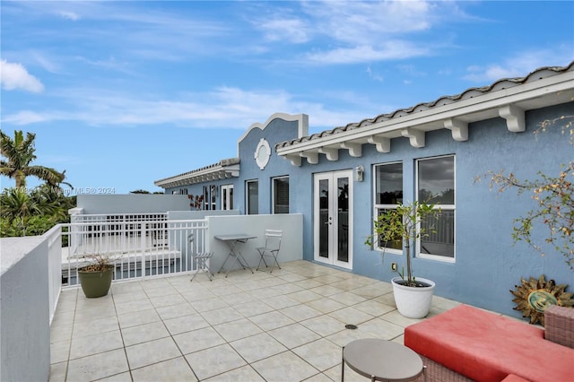 view of patio featuring french doors