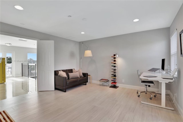 office area featuring light wood-type flooring