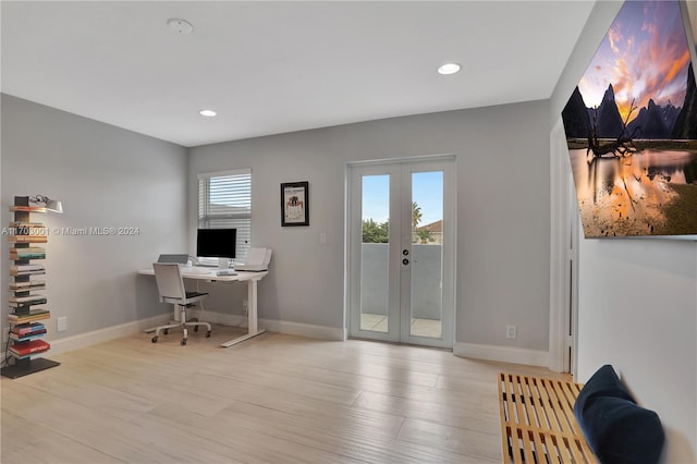 office area with french doors and light wood-type flooring