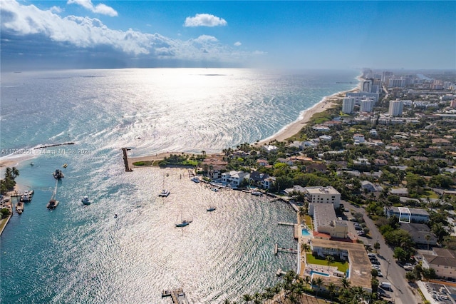 aerial view featuring a water view and a beach view