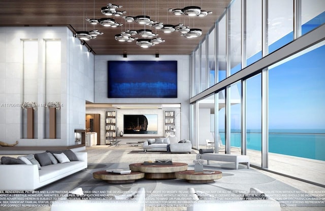 living room featuring a towering ceiling and a wealth of natural light