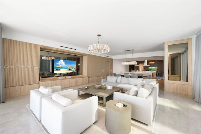 living room with an inviting chandelier