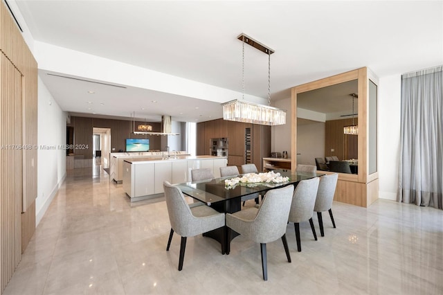 dining room with wooden walls and sink