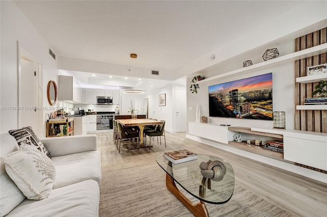 living room featuring light hardwood / wood-style floors