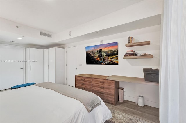 bedroom featuring light hardwood / wood-style flooring