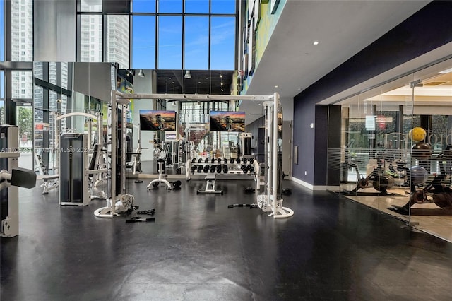 workout area featuring a wall of windows