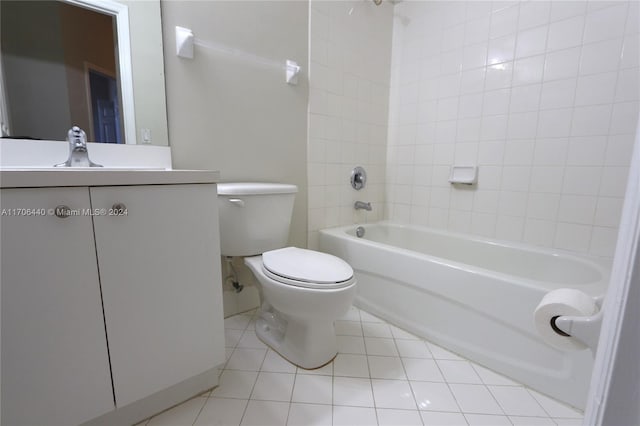 full bathroom with tile patterned floors, vanity, toilet, and tiled shower / bath