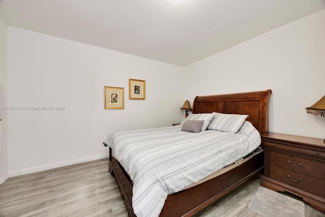 bedroom featuring light wood-type flooring