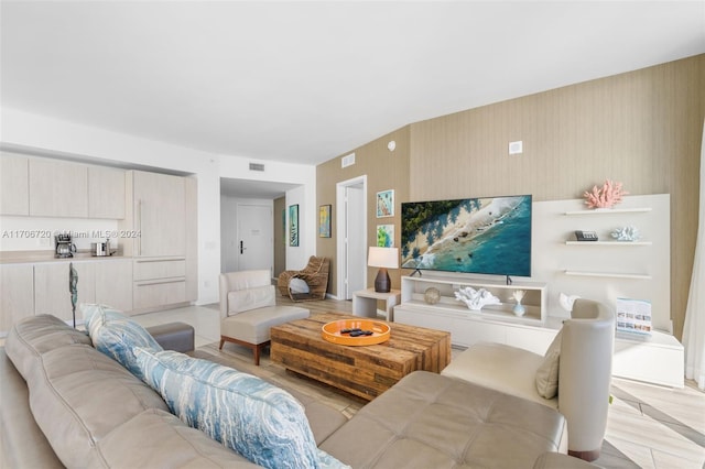 living room with light hardwood / wood-style floors