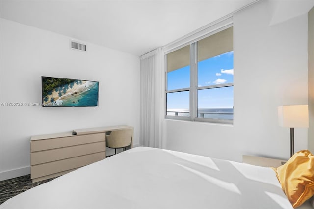 bedroom with a water view