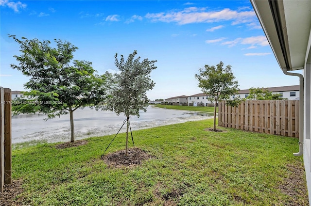 view of yard with a water view