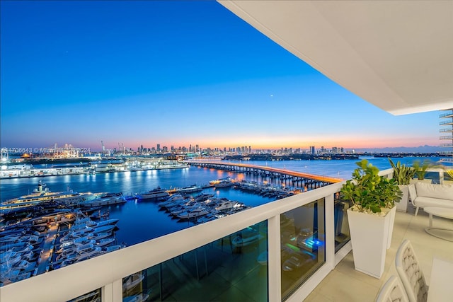 balcony at dusk with a water view