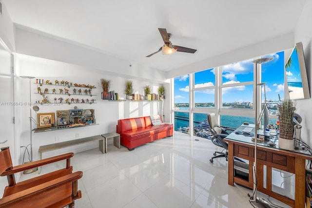 office with ceiling fan and light tile patterned floors