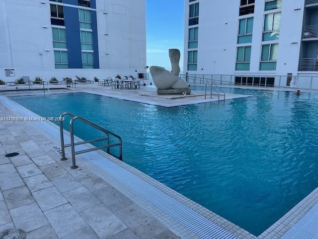 view of pool with a patio