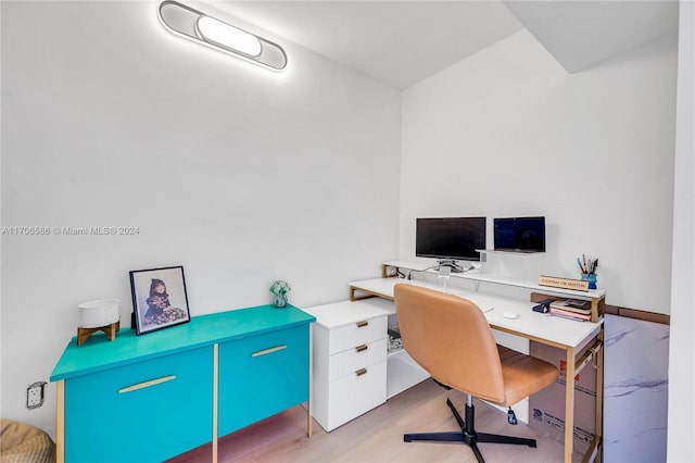 office with light hardwood / wood-style floors