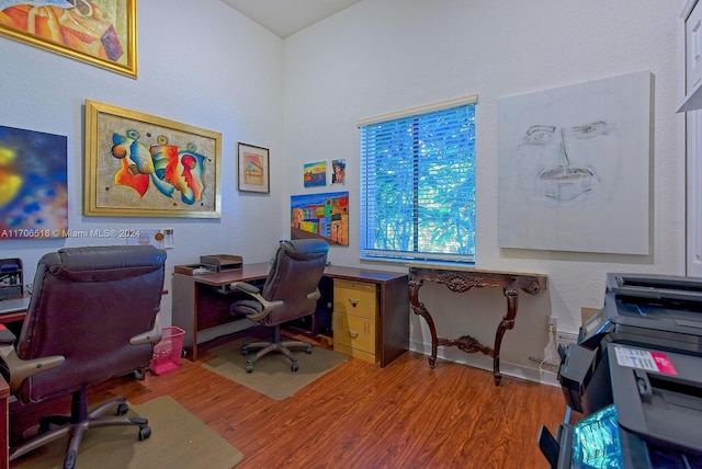 home office featuring hardwood / wood-style flooring