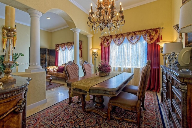 tiled dining room featuring crown molding, plenty of natural light, and an inviting chandelier