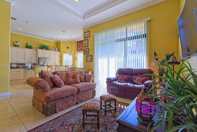 living room featuring crown molding and light tile patterned flooring