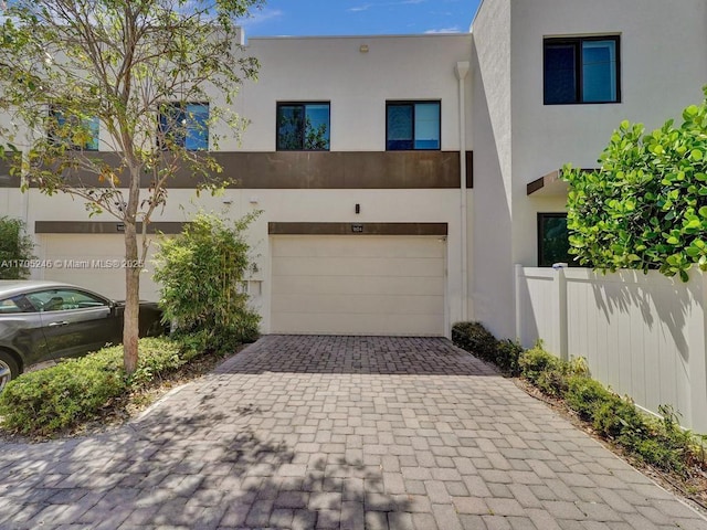 view of front of home with a garage