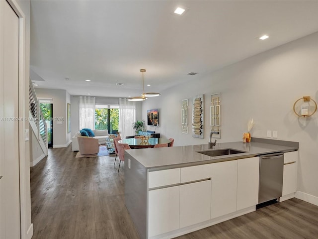 dining area featuring light hardwood / wood-style floors and sink