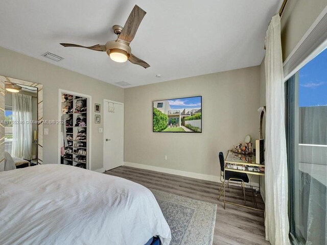 living room with french doors and hardwood / wood-style flooring