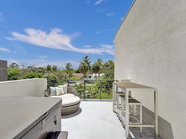 view of patio / terrace with a balcony