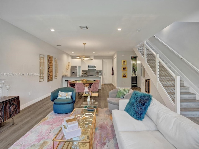 living room featuring hardwood / wood-style floors