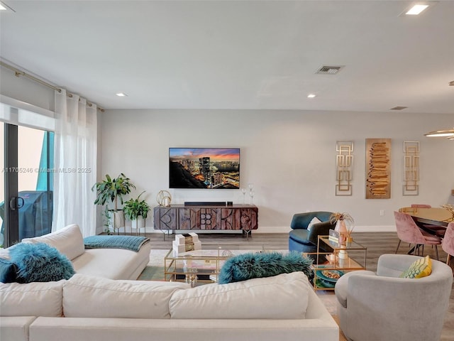 living room with hardwood / wood-style flooring