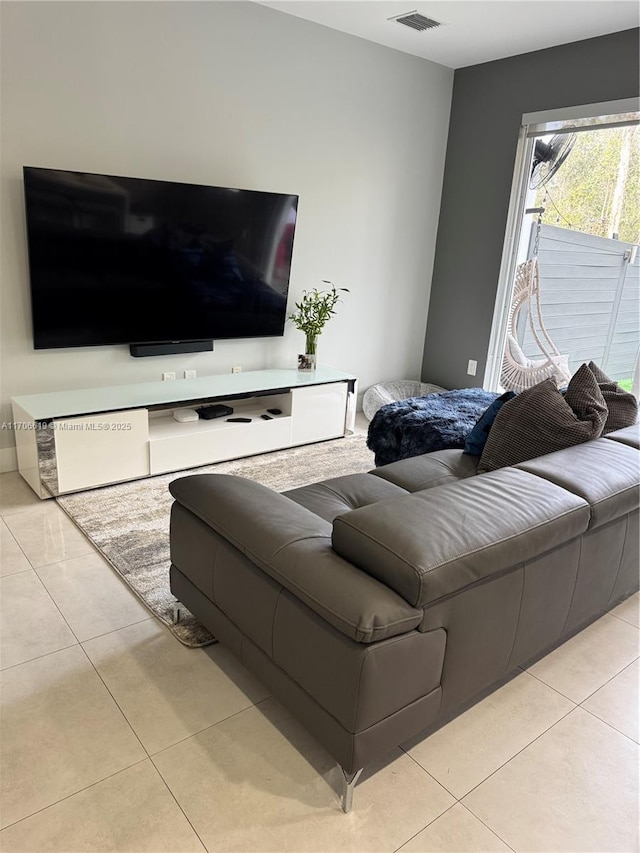 living room featuring light tile patterned floors