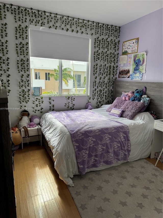 bedroom featuring hardwood / wood-style flooring