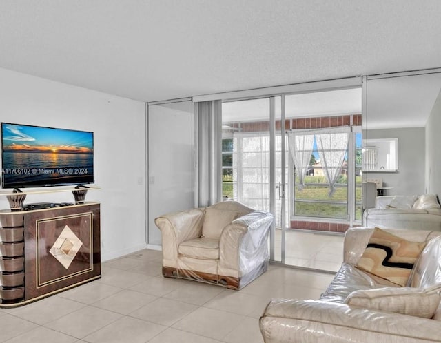 tiled living room with a textured ceiling