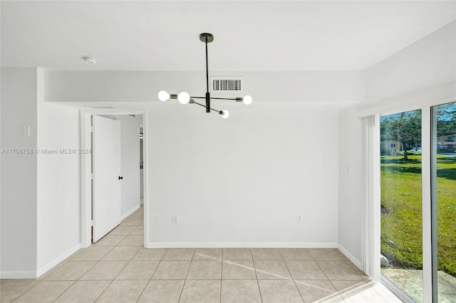 unfurnished room with light tile patterned floors