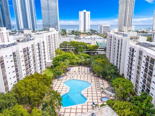 birds eye view of property with a water view