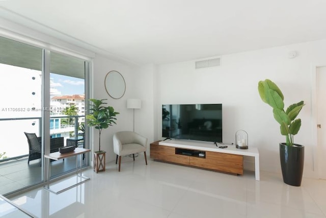 living room featuring light tile patterned flooring