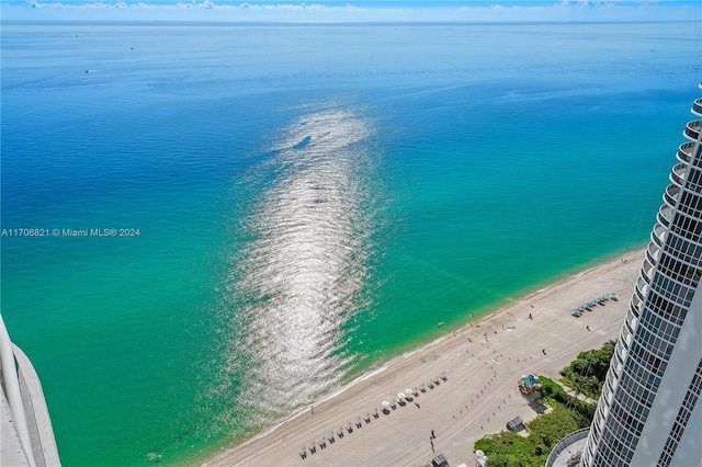 aerial view featuring a beach view and a water view