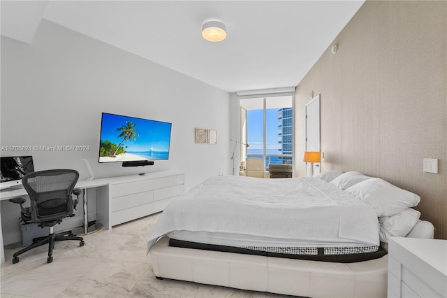 bedroom with floor to ceiling windows