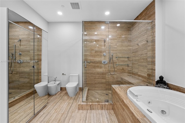 bathroom with a bidet, wood-type flooring, shower with separate bathtub, and toilet