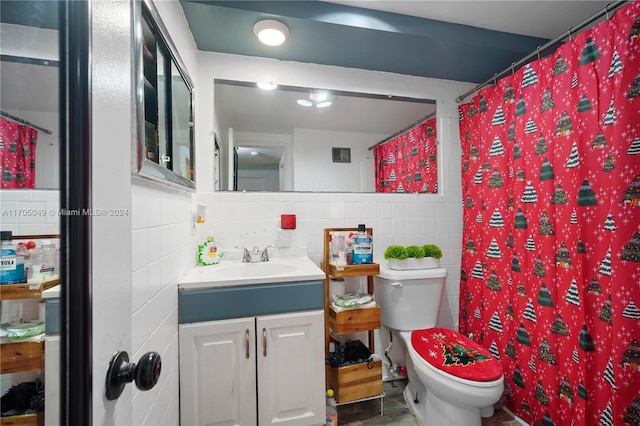 bathroom with vanity, backsplash, a shower with curtain, toilet, and tile walls