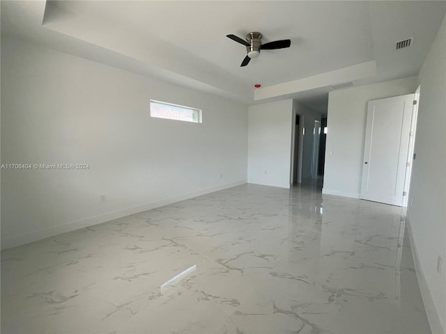 unfurnished room with ceiling fan