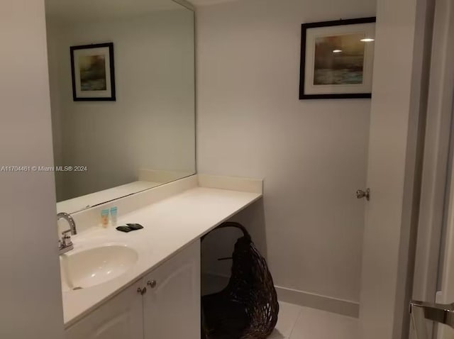 bathroom featuring tile patterned floors and vanity