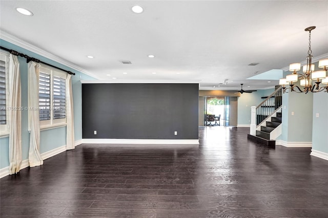 unfurnished living room with crown molding, dark wood-type flooring, and ceiling fan with notable chandelier